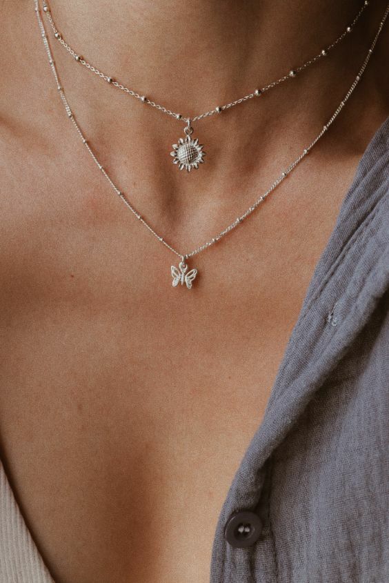 שרשראות מדורגות של פרח חמניה ופרפר קטן מכסף טהור 925.jpg